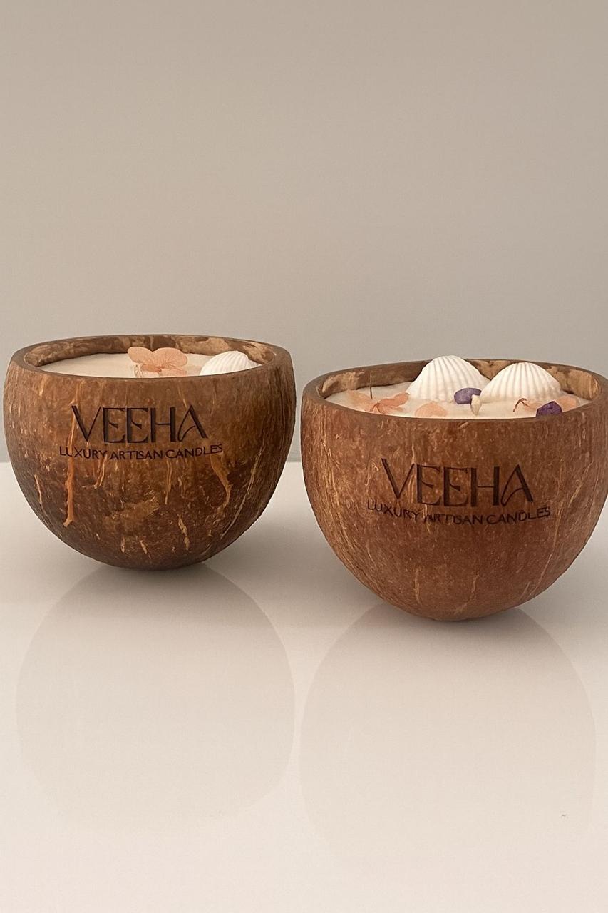 Studio Veeha coconut shell candles with shells and petals